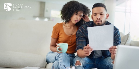 Couple looking over a bill