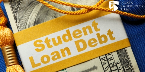 student loan debt slip with tassels and dollars