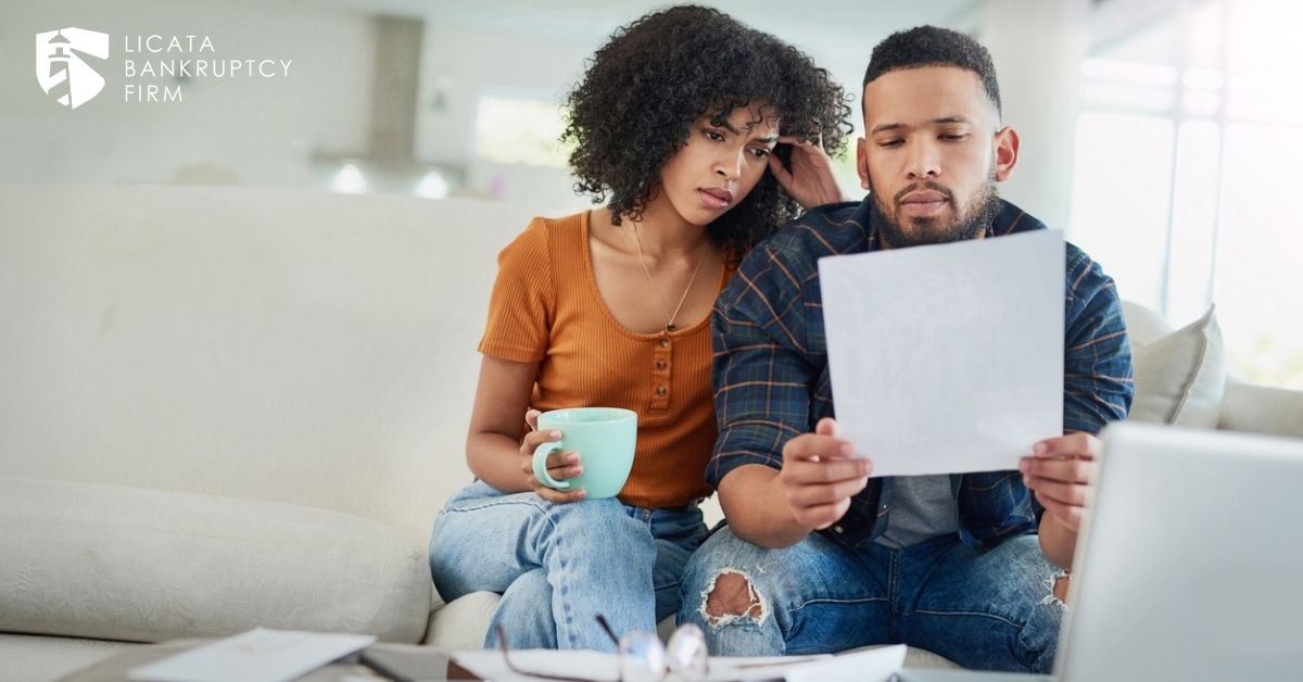 Couple looking over a bill